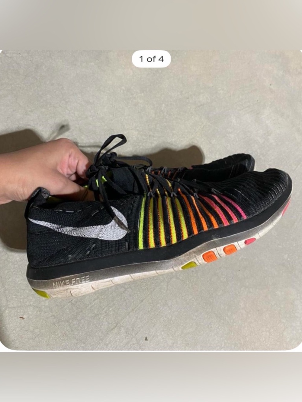 Nike Black Flyknit Trainer with Rainbow Stripe Accents
